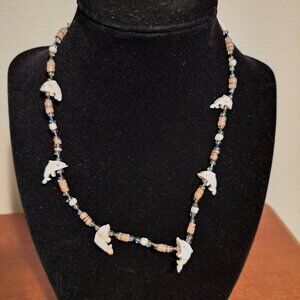 Handmade Navajo Beaded 17.5" Necklace With Dolphins. Silver twist lock clasp.